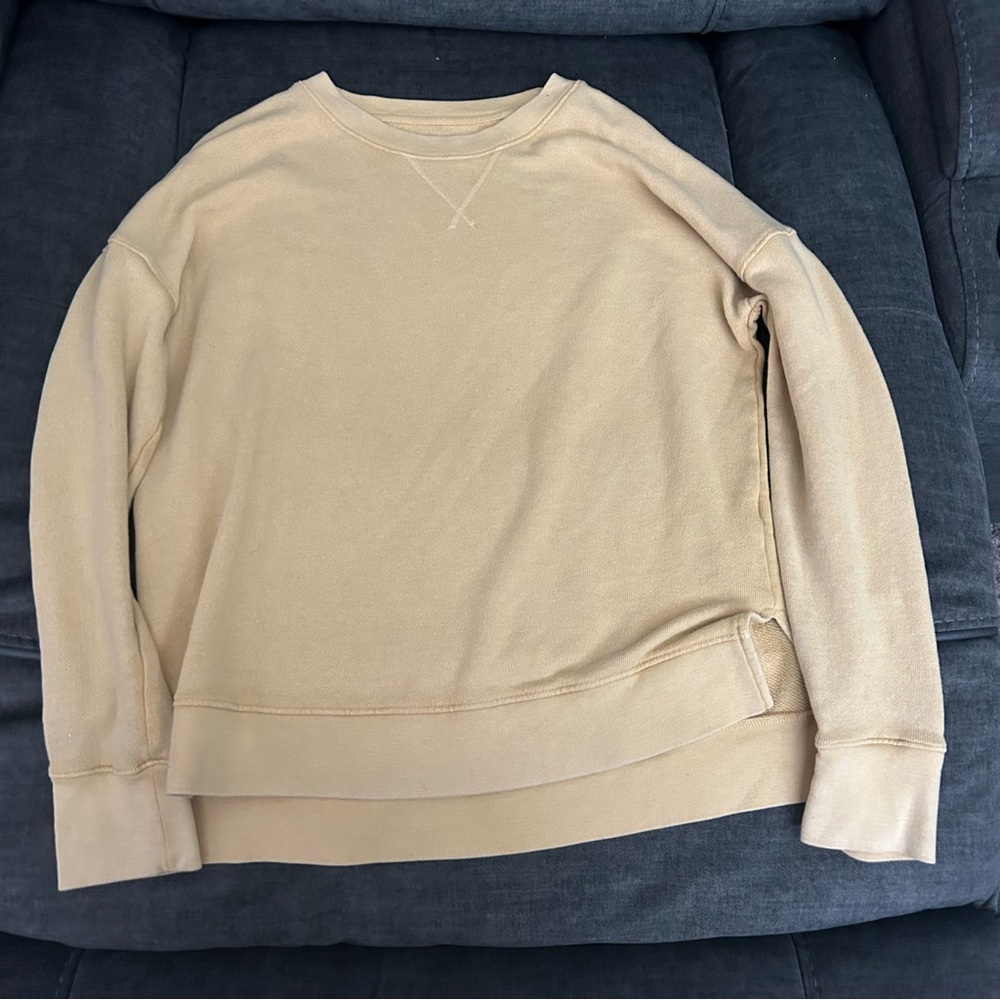 Yellow sweater with slit on both sides